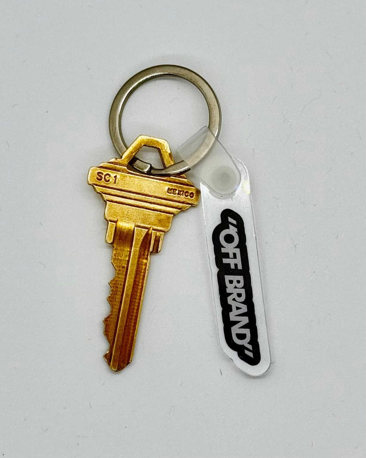 “OFF BRAND” TOPOGRAPHIC 1.5IN KEYCHAIN